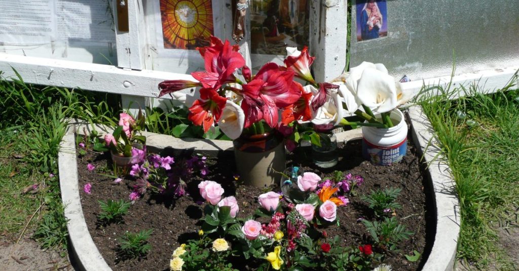Shrine at Coogee Beach, at spot where people thought they saw a vision of the Virgin Mary in 2003 (actually an illusion created by the shape of the fence and the shadow it cast, which is why it was never seen on cloudy days), Coogee, Sydney 