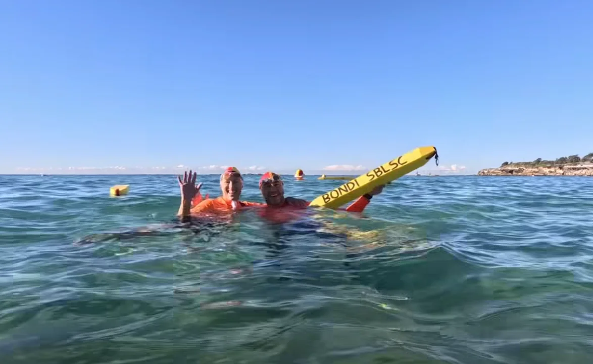 Swimmers entering water at Coogee Beach